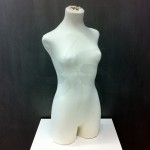 Female bust form with legs for sewing or exhibiting clothes