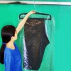 Dust-proof plastic cover for skirt or pants