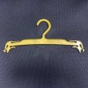 Gold plastic hanger for lingerie 22-26 cm.