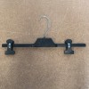 Plastic hanger for skirts and pants with slide clamps 24-30-36-40 cm.