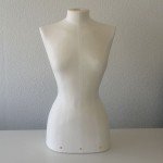 Female bust form for sewing or exhibiting clothes