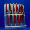Display rack for pens with back sign